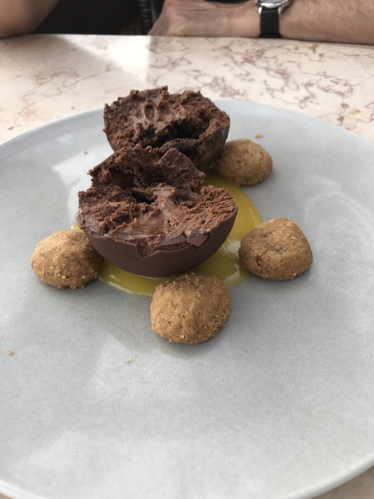 Chocolate sphere dessert at Manta Ray, Tel Aviv