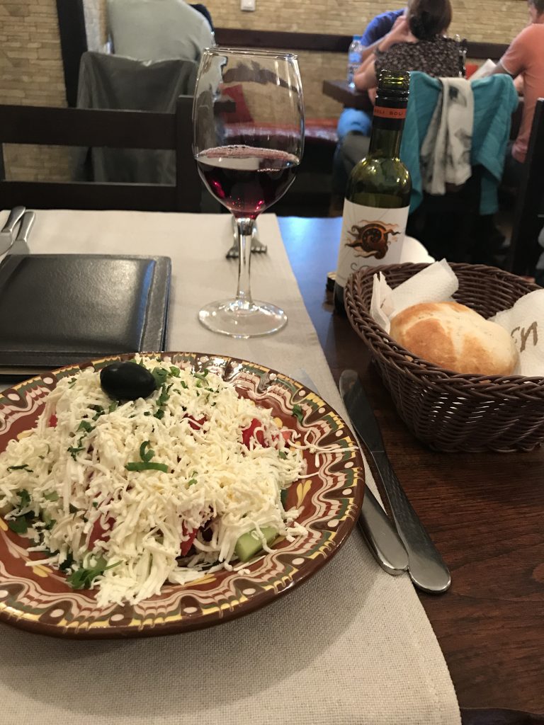 Shopka salad and red wine at Izbata Tavern