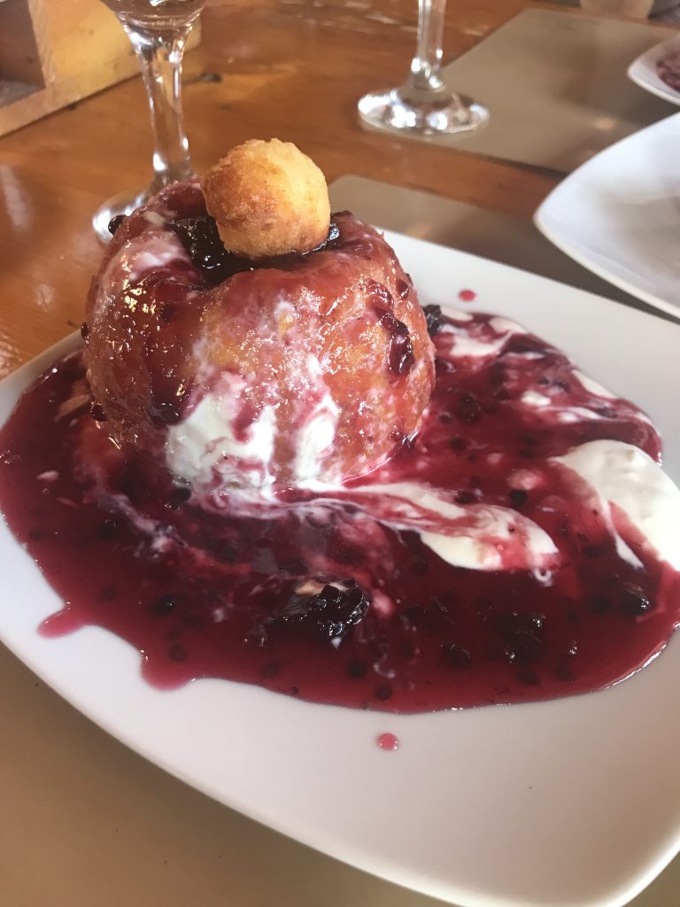Casa Vila Bran- fried donuts with fresh cheese and berry sauce