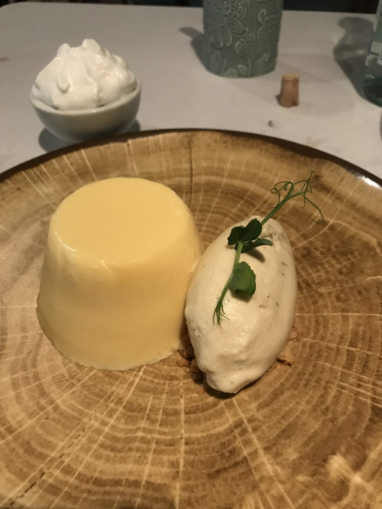 Dessert at Kokosnot- passion fruit flan smoked on the grill, with thyme ice cream and smoked coconut foam