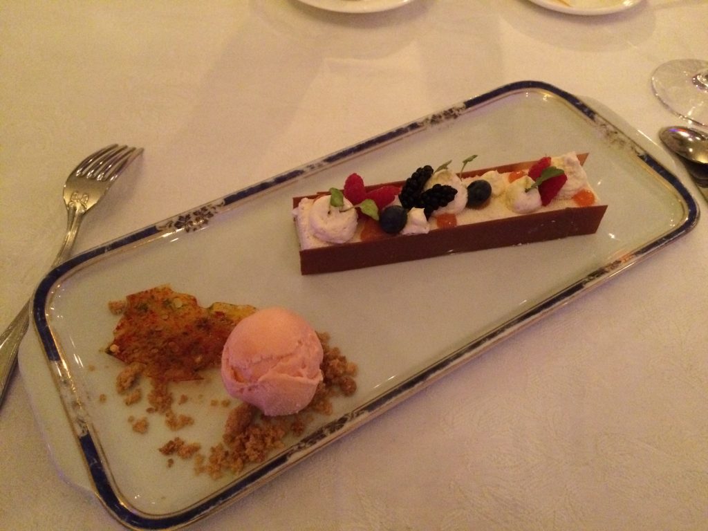 Dinner at Palkin - white chocolate and rooibos cream served with pink pepper ice cream