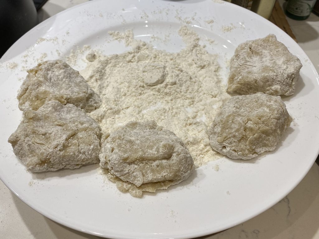 Coat the potato patties with flour