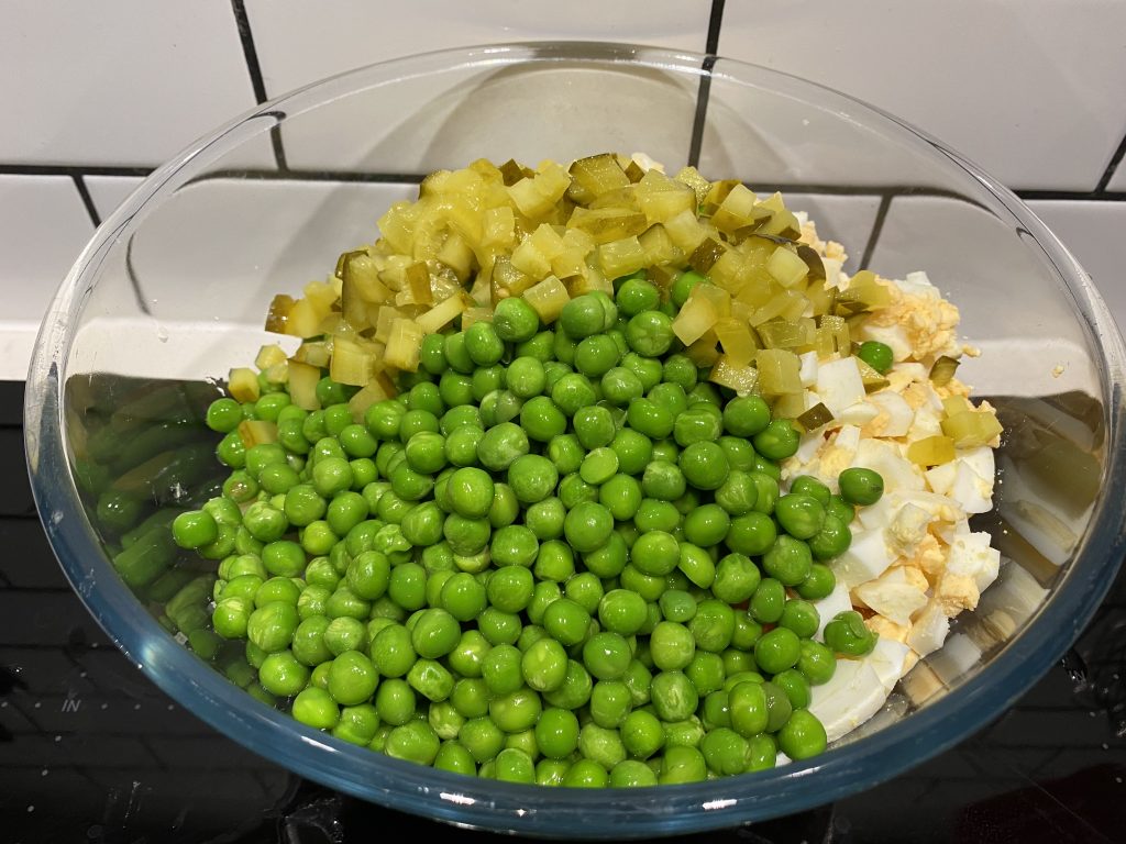 Adding peas and pickles