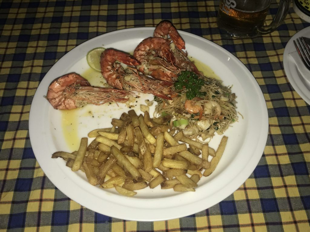 My dinner at Coco Beach was grilled prawns with seafood noodles and chips