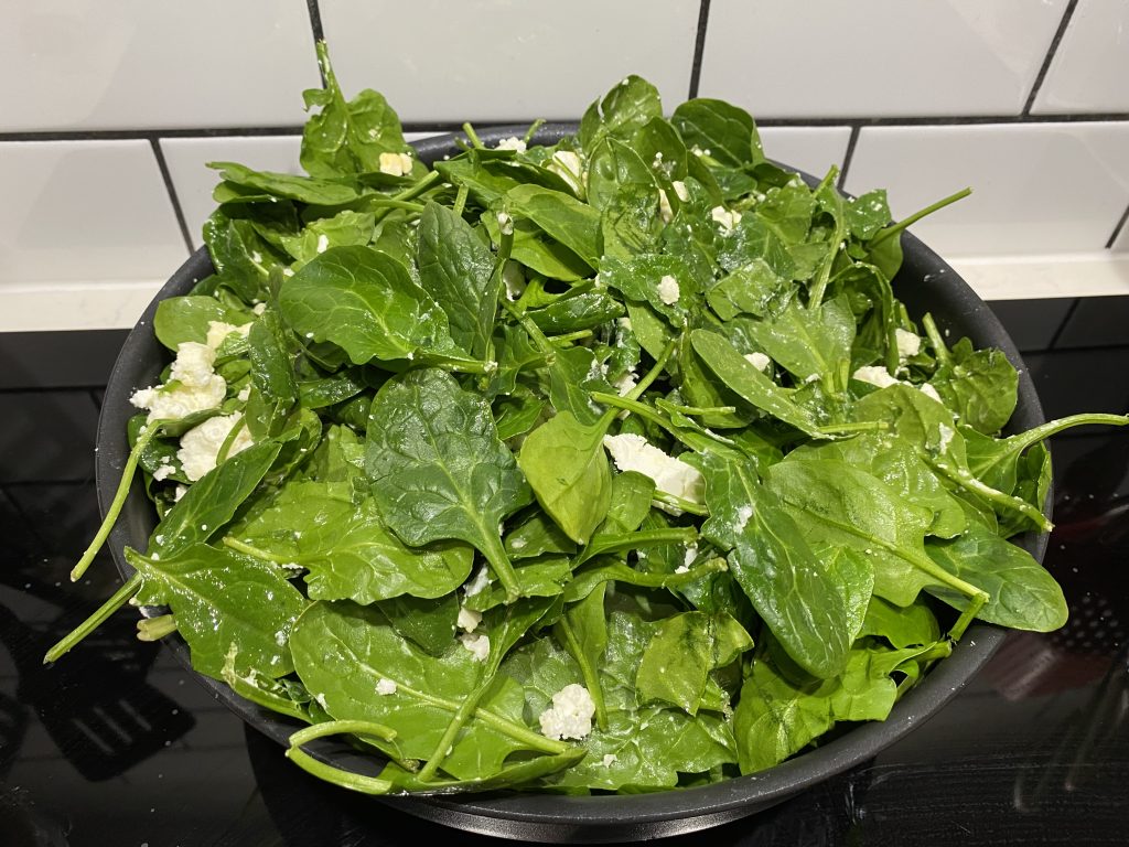 Crush together the spinach and feta