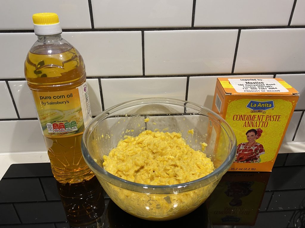 Corn oil, mashed corn and annato or achiote