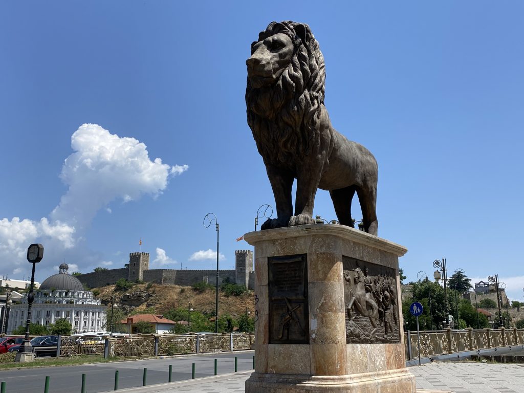 Lion on Gotse Delchev bridge with Skopje Fortress