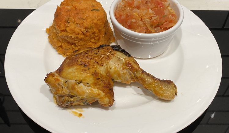 Amiwo with chicken and tomato onion sauce