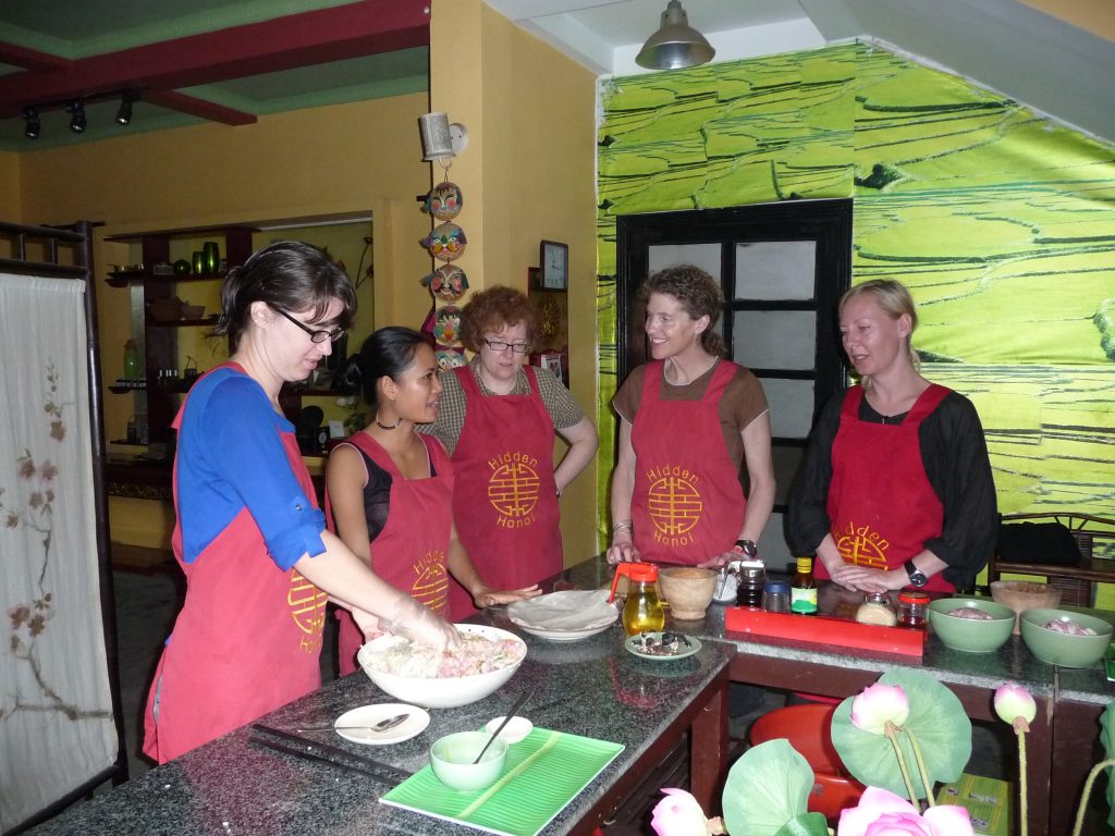 Making spring rolls at the Hidden Hanoi course