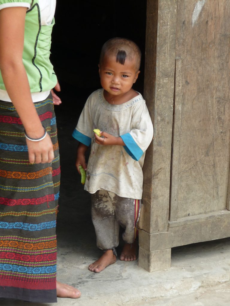 Kids in the village- loved this little guy's haircut