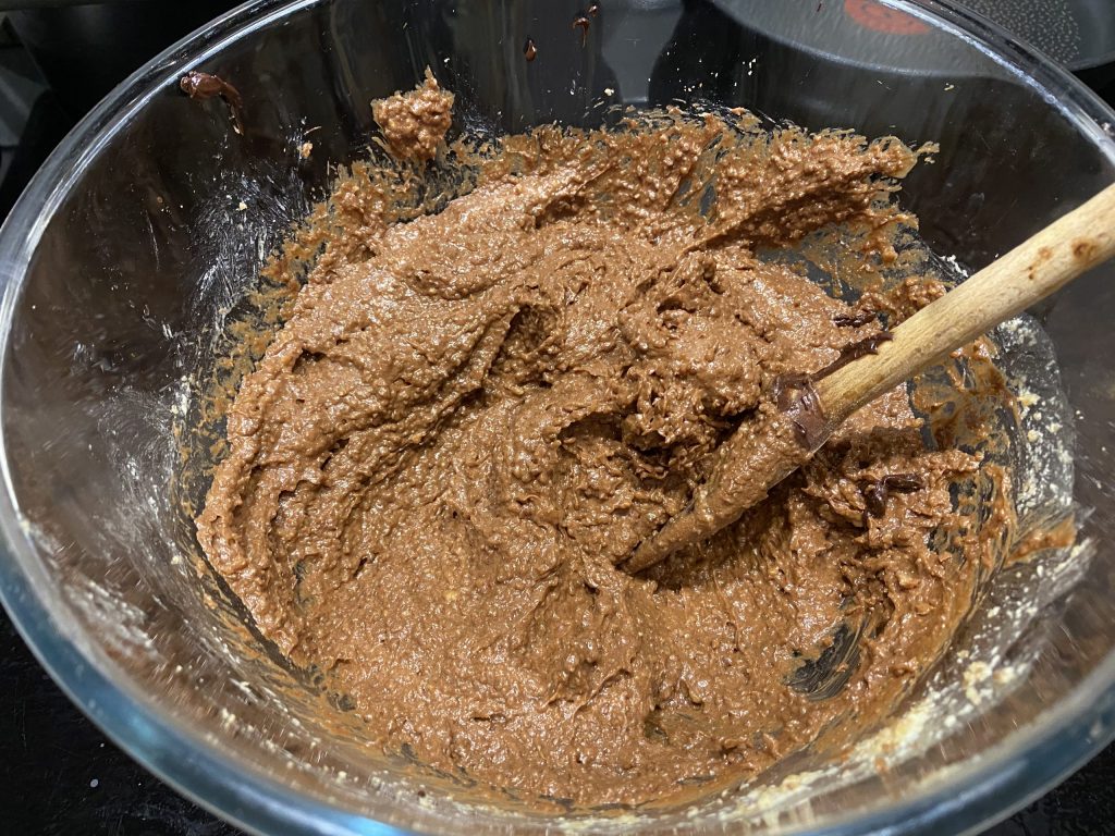 Stirring the chocolate into the filling
