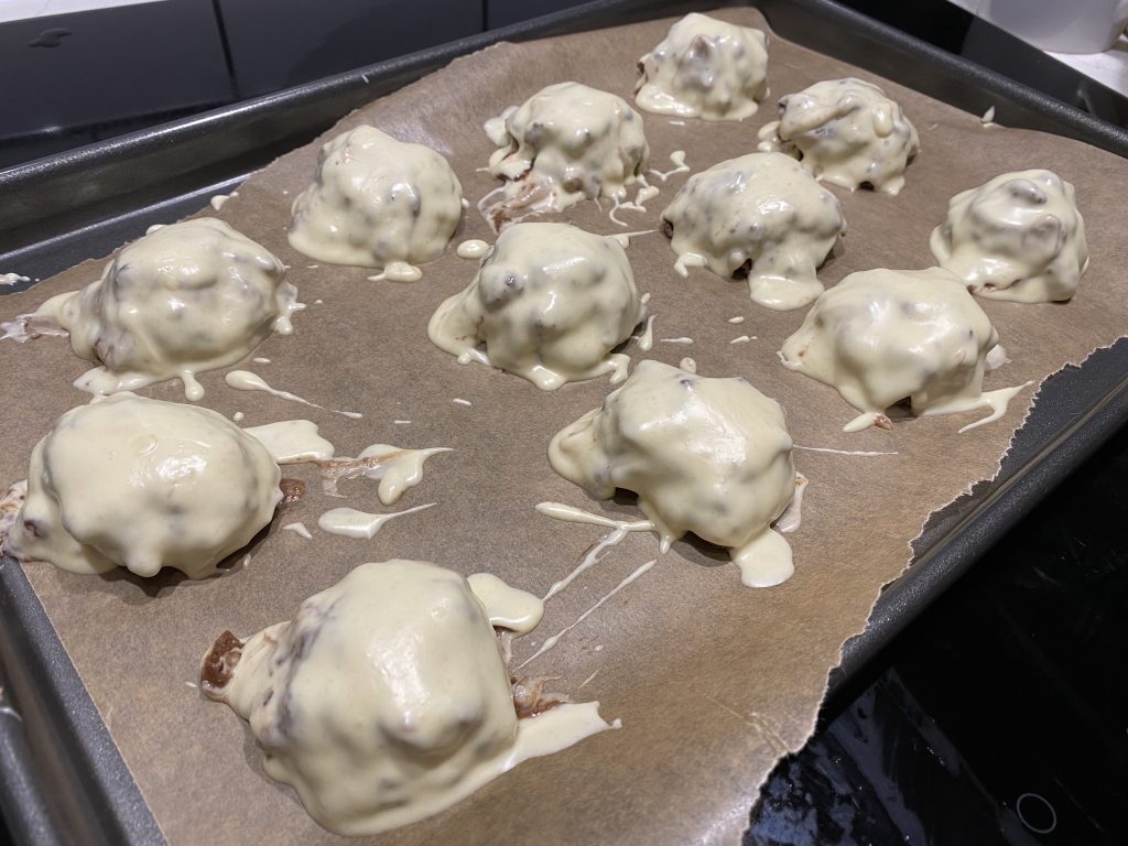 Coating the truffles with white chocolate