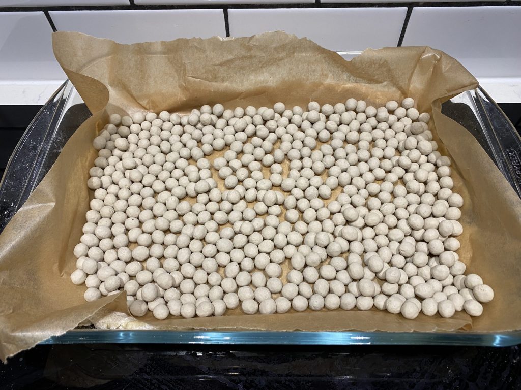Baking beans for blind baking the bottom layer of pastry