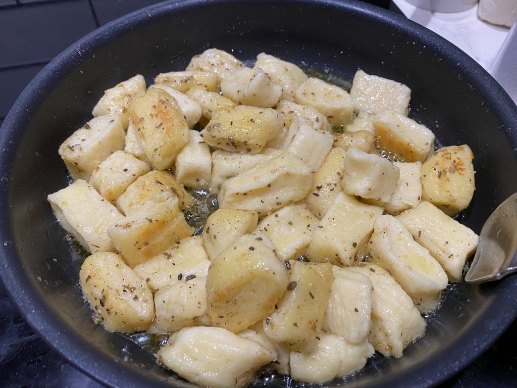 Frying the ricotta gnocchi in the sage butter