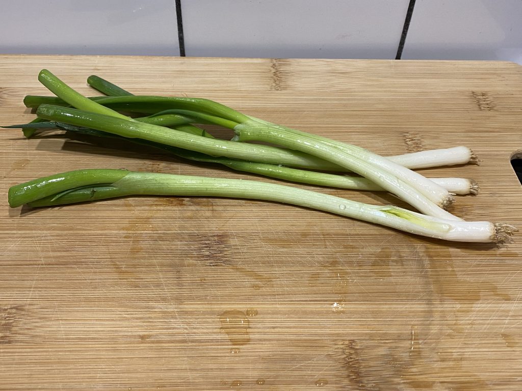 Spring onions to top the braised miso tofu