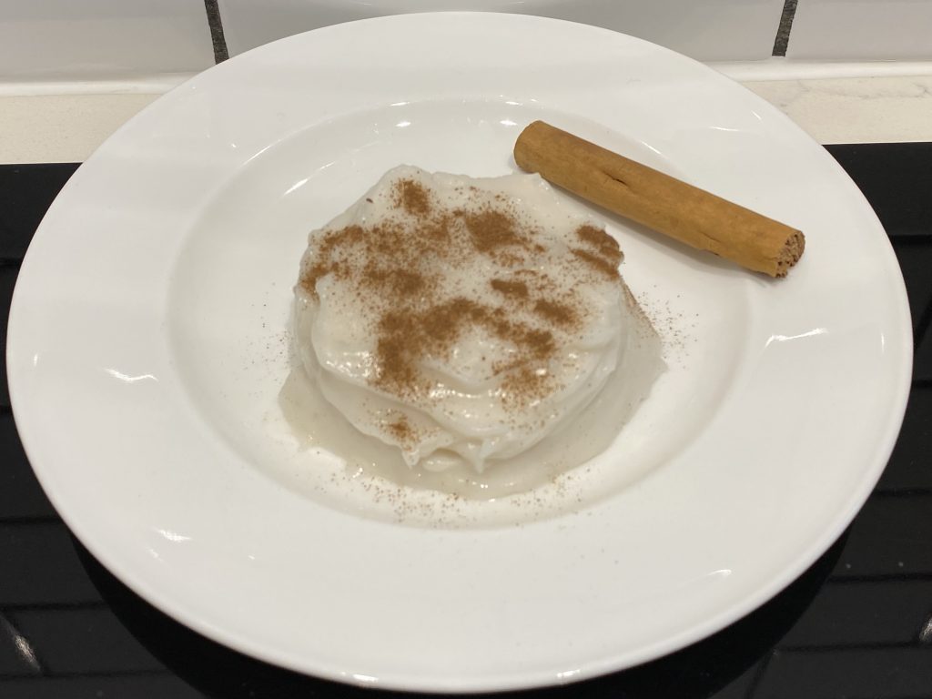 Tembleque served with cinnamon