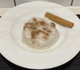 Tembleque served with cinnamon