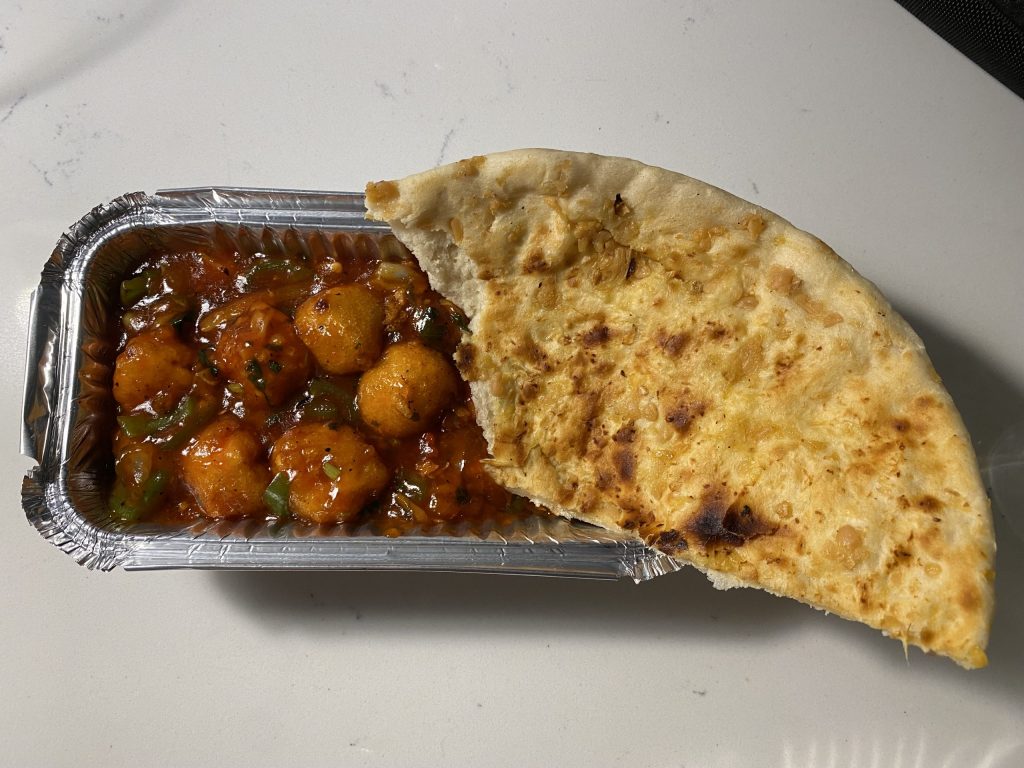 Chili paneer and naan from Neha Curry House