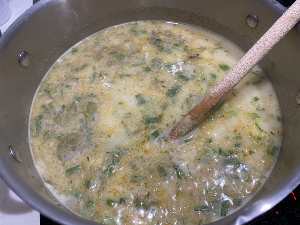 Fish soup with coconut milk, herbs and spices