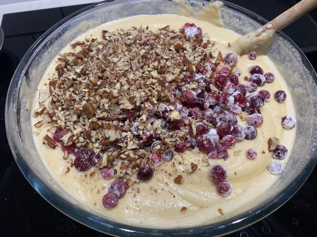 Fold in the cranberries and pecans