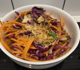 Asian slaw sprinkled with fried shallots