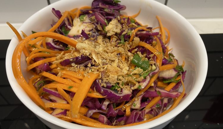 Asian slaw sprinkled with fried shallots