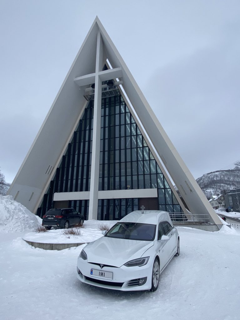 Arctic Cathedral with Tesla hearse