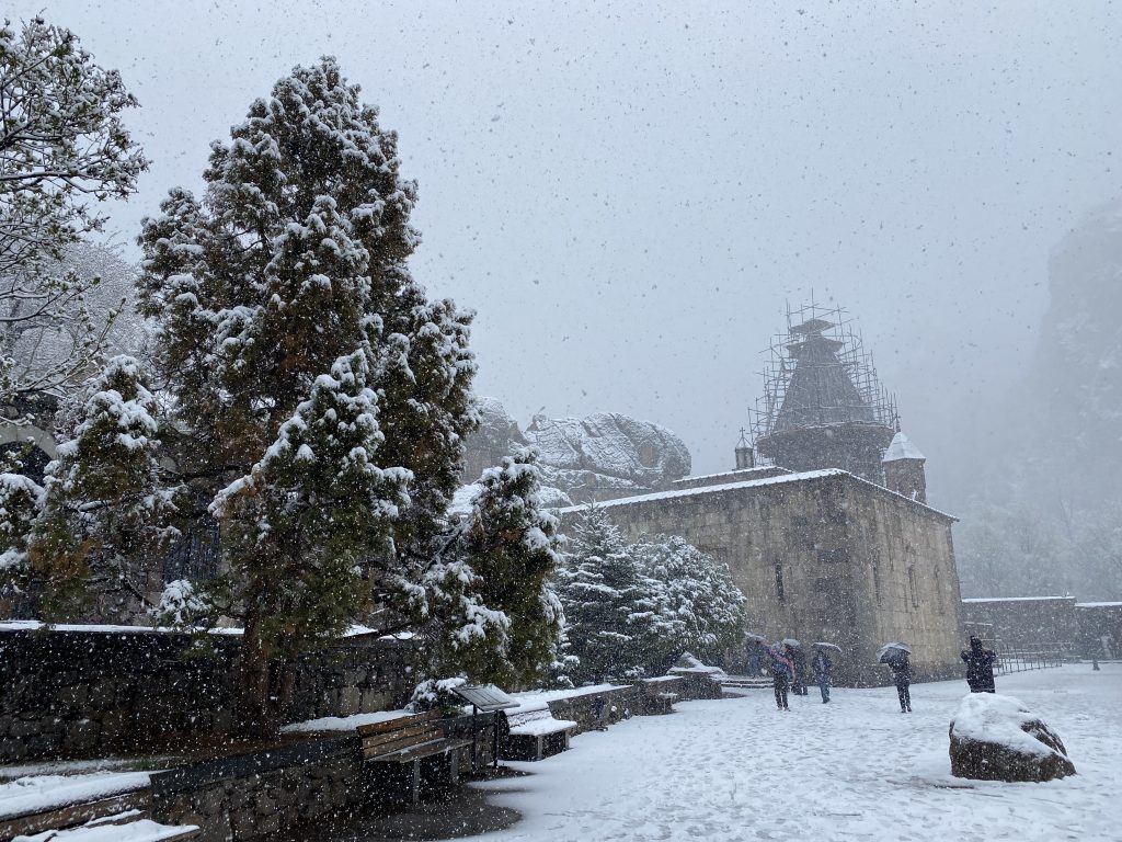 Geghard monastery in a snowstorm
