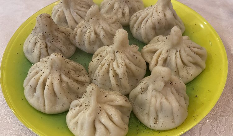 Freshly cooked khinkali with pepper