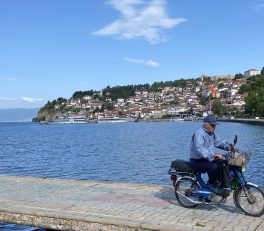 Motorcycle riding down the Lake Ohrid pier